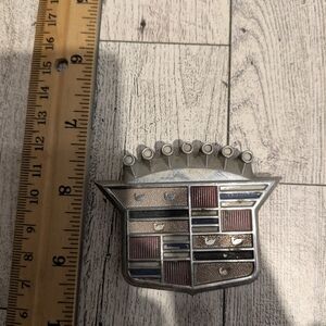 Cadillac Silver and Red Car Emblem